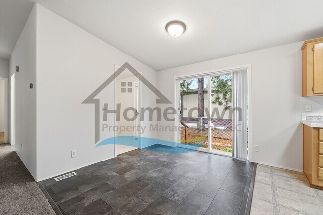 Building Photo - 2 Bedroom 2 Bathroom Home with Attached 2-Car Garage Available in Athol!