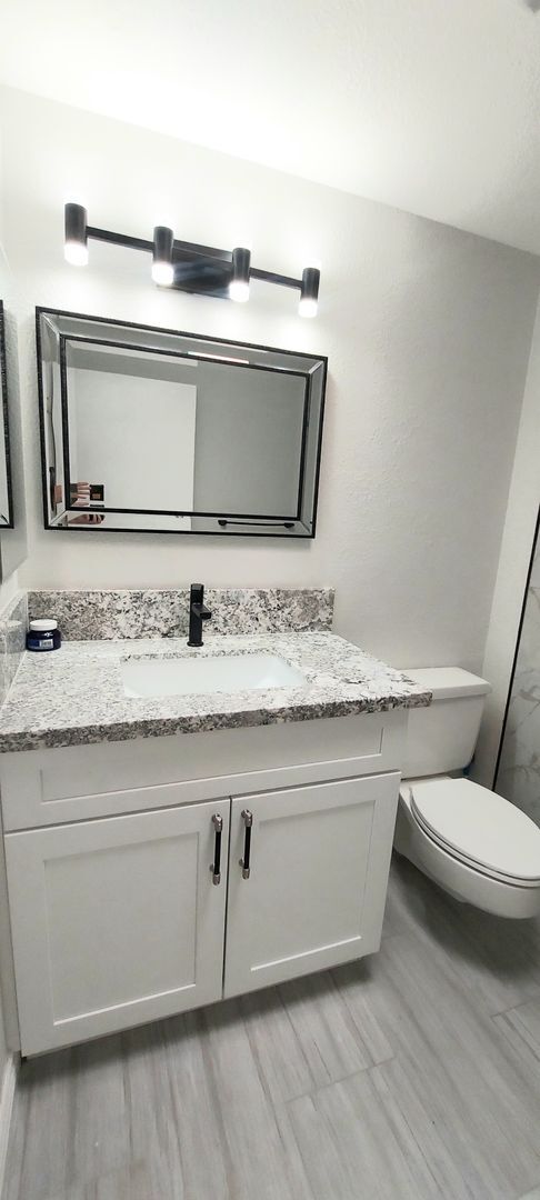 Building Photo - * UTILITIES INCLUDED * TOTALLY REMODELED 2X2