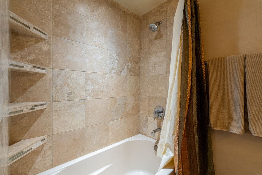 Travertine tile. - 2132 Ridgeview Cir
