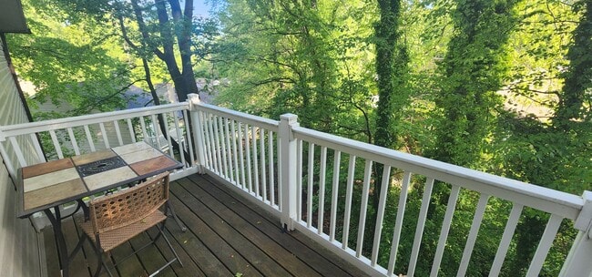 Building Photo - Fully furnished meticulously maintained upper condo