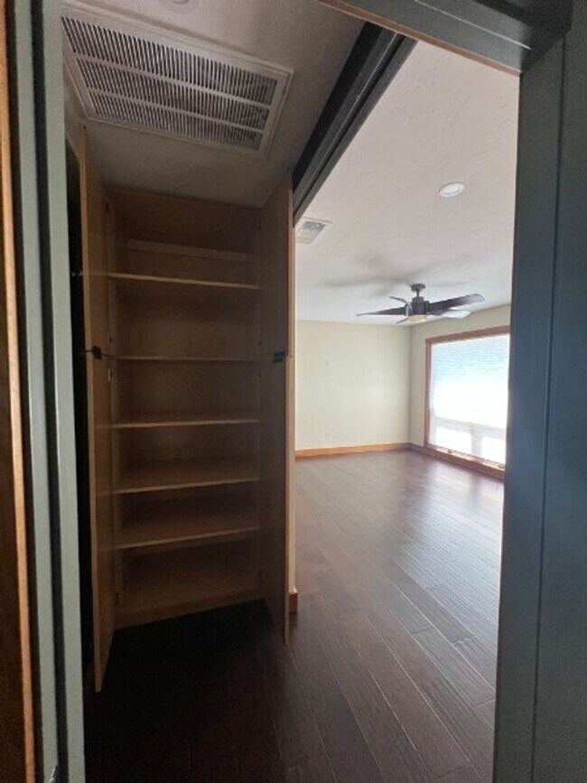 Building Photo - Artisan-Built Custom Cottage Retreat | Private Yard, Garage & EV Charging Ready