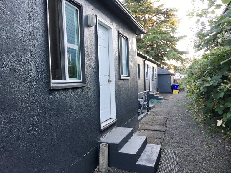 back door of 35 to shared backyard space - 35 NE Going St
