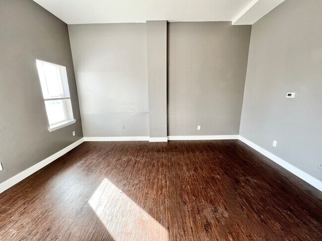 Embrace the elegance of this bright living space, perfect for personal touches. - Williams Street