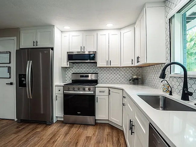 Building Photo - Remodeled 3 bedroom, 3 bath home with addi...
