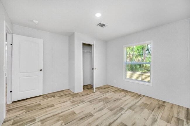 Building Photo - Experience exceptional living at its finest