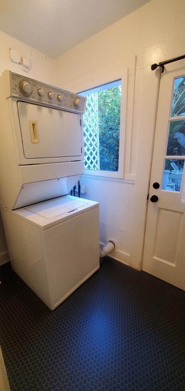 Stacked Washer and Dryer on the service porch - 1229 N Orange Grove Ave