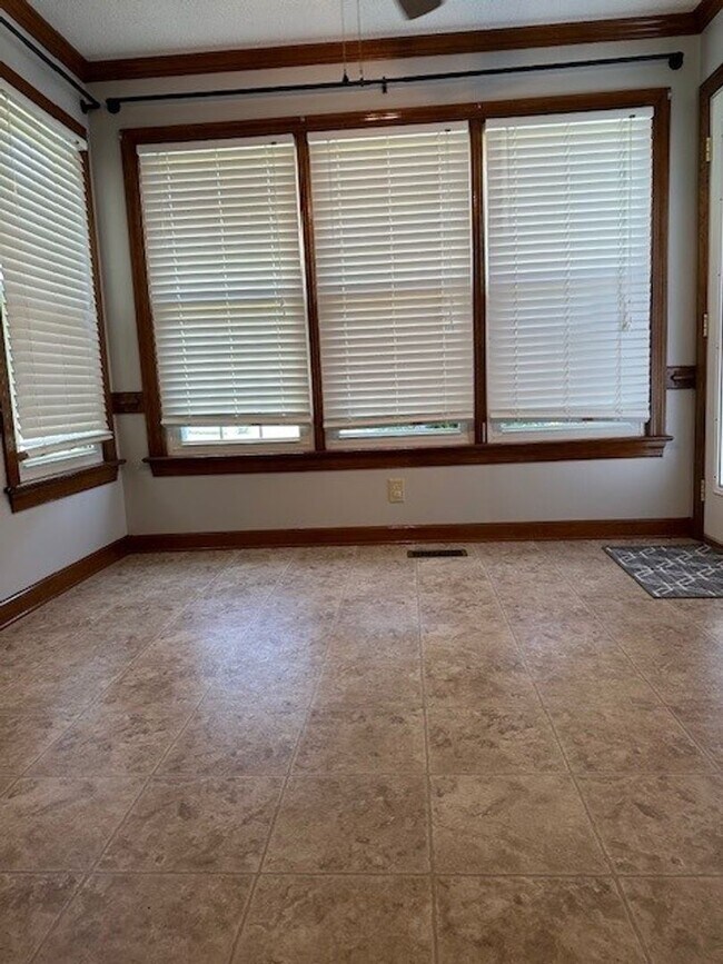 Building Photo - Spacious Home with Bonus Room, Pool & Sola...