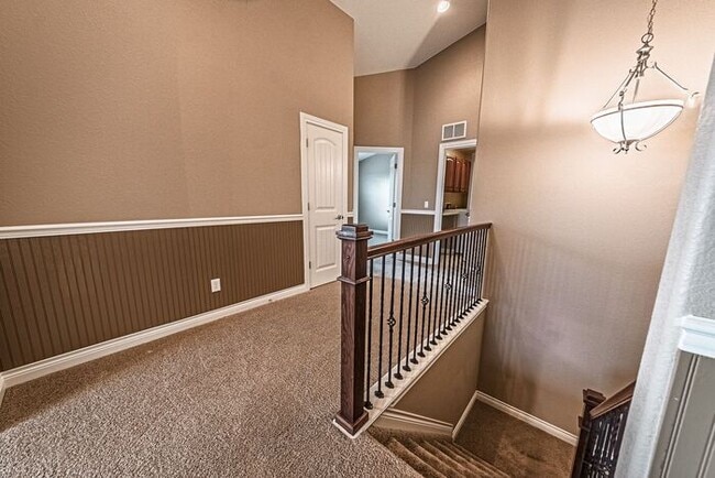 Building Photo - Stunning 5BR Home with Luxury Master Suite & Low-Maintenance Yard!