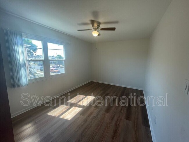 Building Photo - 9449 Normandie Ave