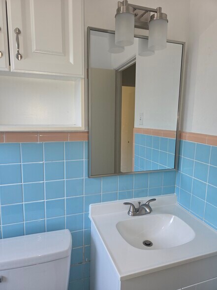 Bathroom new vanity, mirror and toilet - 644 E Harwood St