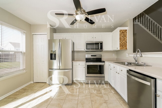 Building Photo - Turn the key. Enter. Smile. Repeat every day!