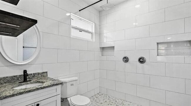 Building Photo - 1411 E 24th Ave