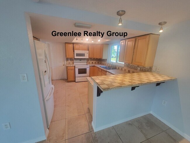 Building Photo - 7741 Treasure Pointe Dr