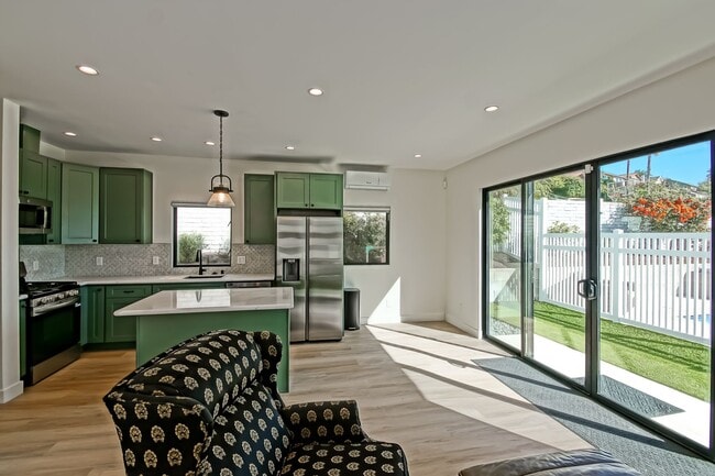Building Photo - Beautifully Remodeled, Bright & Modern 4BR3BA Home w/ 2BR1BA Guest House On Sprawling Corner Lot ...