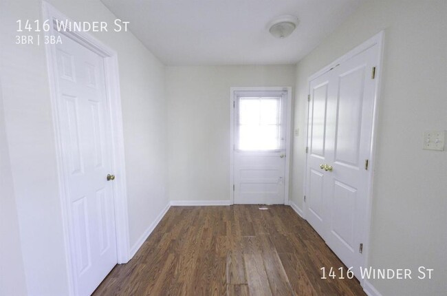 Building Photo - RENOVATED 3 Bed, 3 Bath with 2 Car Enclose...