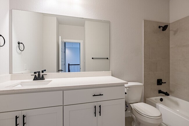 Building Photo - Spacious Buda Beauty Offering Open-Concept Living and Flexible Space for Every Lifestyle!
