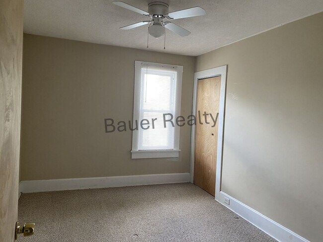 Building Photo - Three Bedrooms, One and a Half Baths