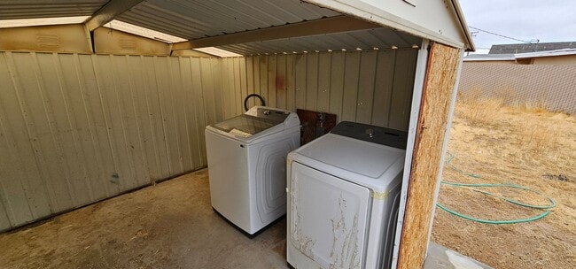Building Photo - Live Large in a Cozy Retreat! Private Back...