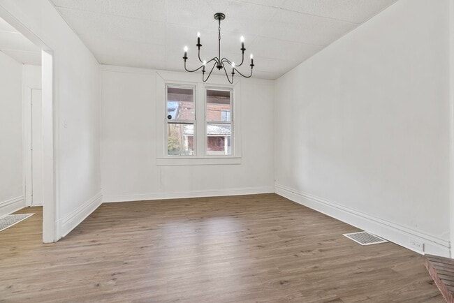 Building Photo - 4 bed 1.5 bath - completely updated, central air, patio.  Great location