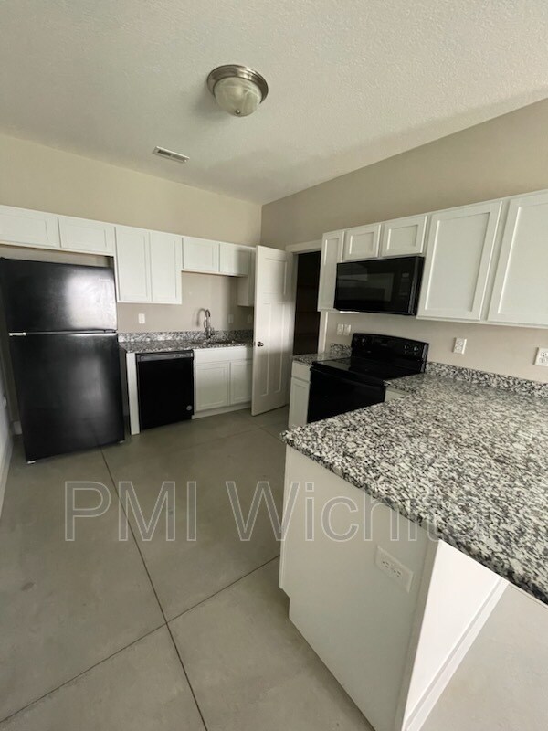 Building Photo - 8111 E 34th Ct S