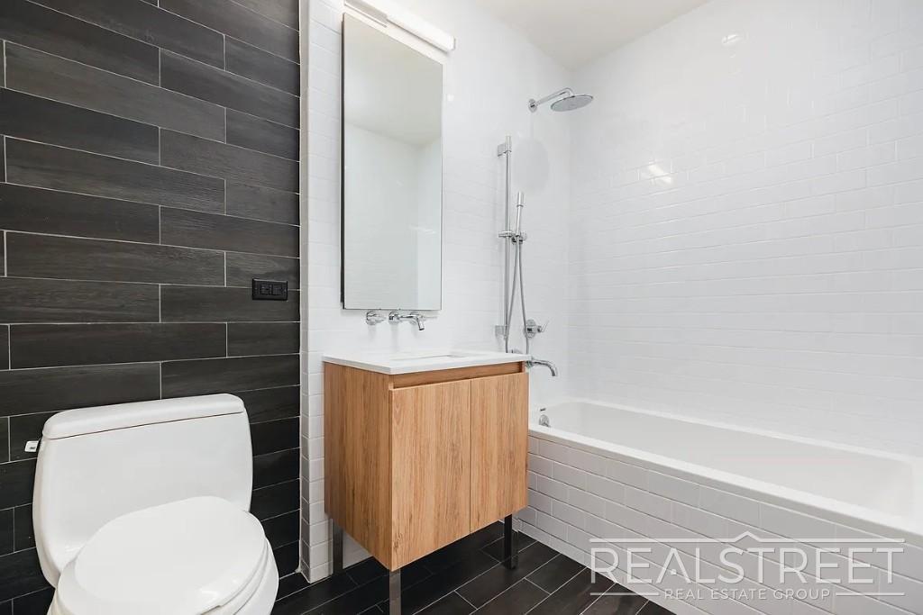 Building Photo - Stunning, Elegant, 2 Bedroom Right off Lorimer L train, Amazing Roof deck, Gym, Great Location!