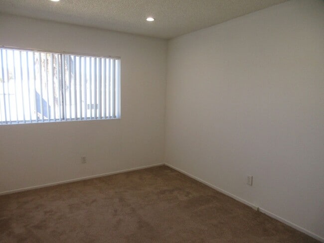 Building Photo - Duggan Property Management, Inc presents  *Reduced*  Canoga Park- 3BD 2.5BA