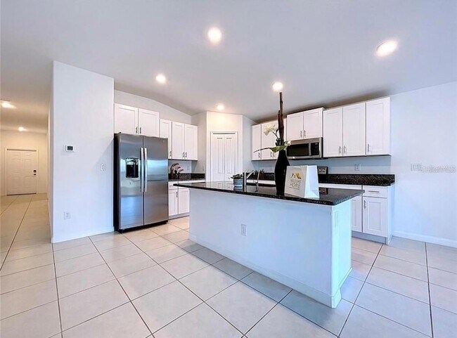 Building Photo - 6557 Bar S Bar Trl