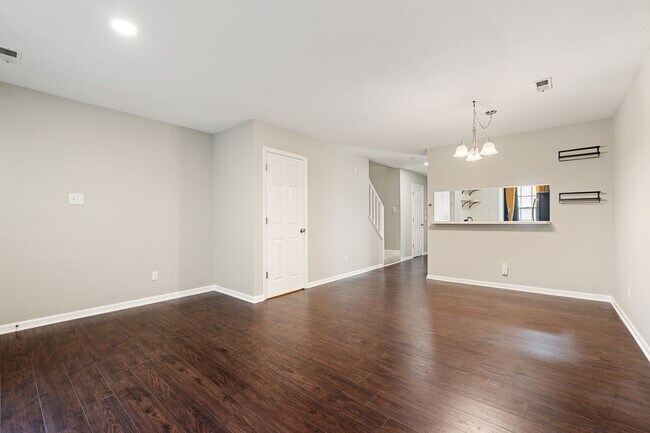 Building Photo - Spacious 3-Level Townhome Minutes from Dow...