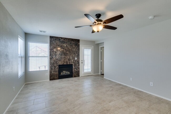 Building Photo - 2 bedroom + Den- Upgraded Flooring ready for immediate move in