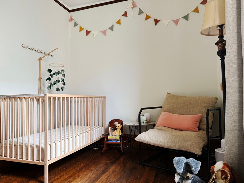 Bedroom 2 is furnished a a nursery--perfect for a young family - 952 N Hoyne Ave
