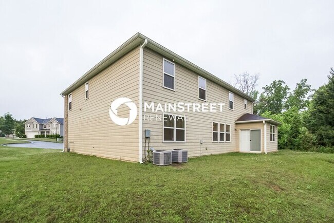Building Photo - 5 Bedroom Pet-Friendly Home in Buford, GA with Main Street Renewal