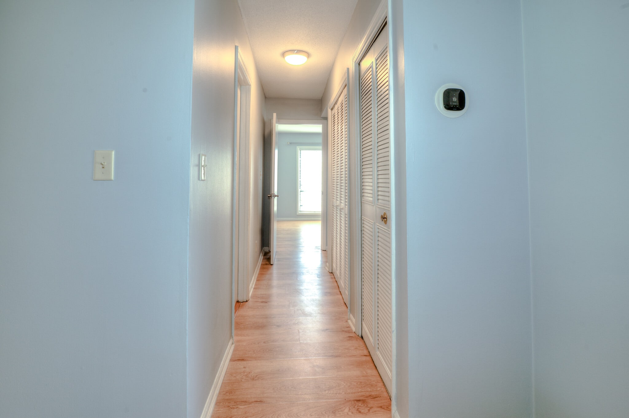 Hall way to second guest bedroom and master bedroom - 6851 Roswell Rd