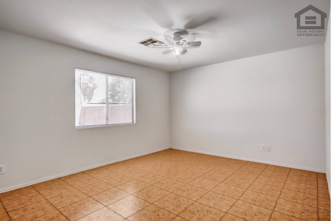 Building Photo - 7407 S Sunrise Way