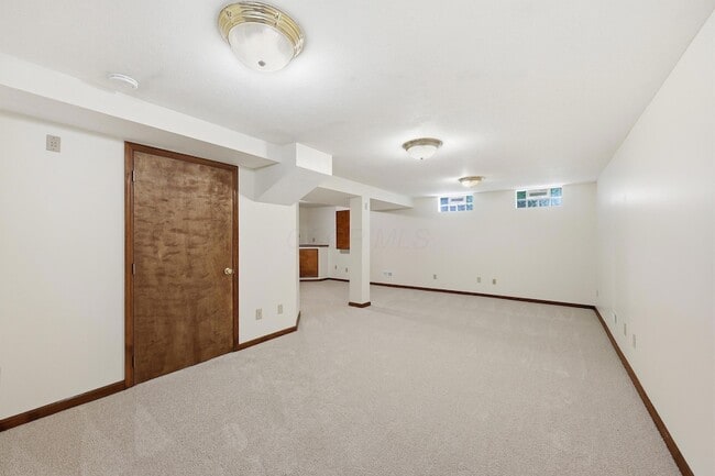 Building Photo - 7666 Windwood Dr