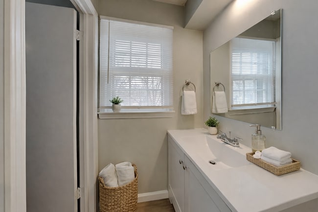 Building Photo - Spacious 4BR Home with Finished Basement, Fireplace & Unique Layout