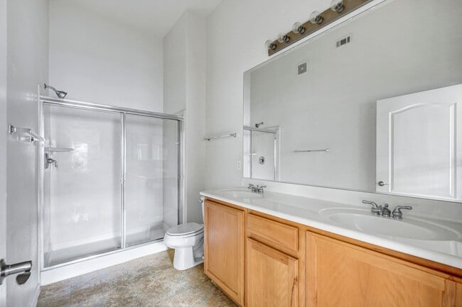 Building Photo - Second Story Condo with Open Floor Plan and Granite Counters