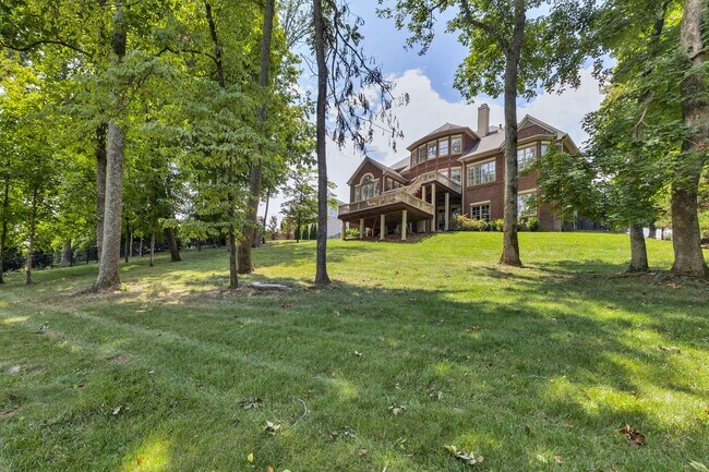 Building Photo - Fully Furnished 4 Bedroom, 3.5 Bath w/ 3 Car Garage and Unfinished Basement in Governors Club