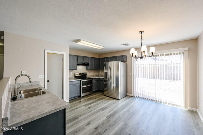 Building Photo - 11779 W Windrose Ave