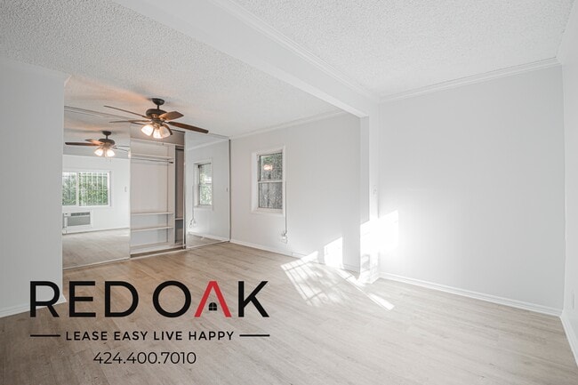 Building Photo - 1309 W 36th Pl