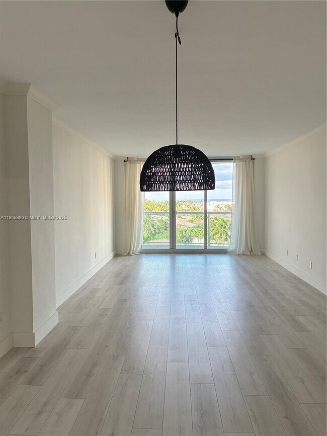 Building Photo - 19380 Collins Ave