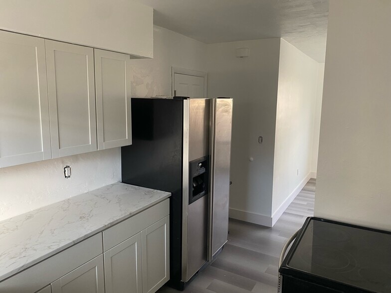 Kitchen to Living Room - 320 NW 34th Ave