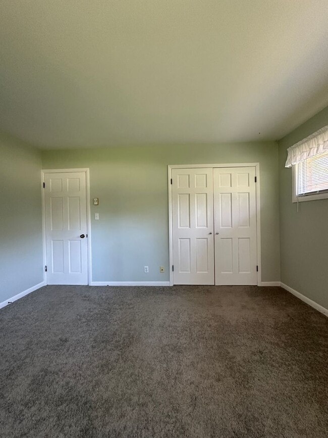 Building Photo - Not Your Typical Rental — Warm, Welcoming 3BR Brick Ranch in a Prime Neighborhood