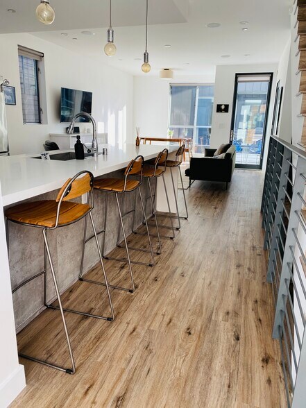 2nd Floor Kitchen Islan (note: Full Motion Smart Flat Screen TV so you can watch while eating at the - 7197 Formosa Fusion Ct