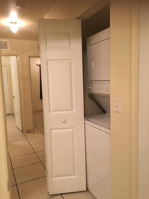 View of hallway showing laundry room - 7632 N Miami Ave