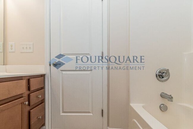 Building Photo - Spacious 3-Bed End Unit Townhome with 2-Car Garage & Private Patio | Prime Kitts Creek Location