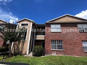 Building Photo - 3/2 Regency Gardens 1st Floor Condo with New Plank Fooring, Stainless Appliances, and Fresh Paint!