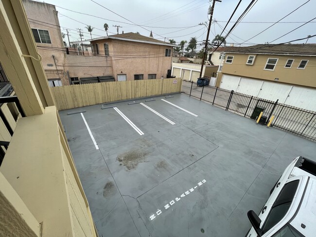 Gated parking - 8453 S Van Ness Ave