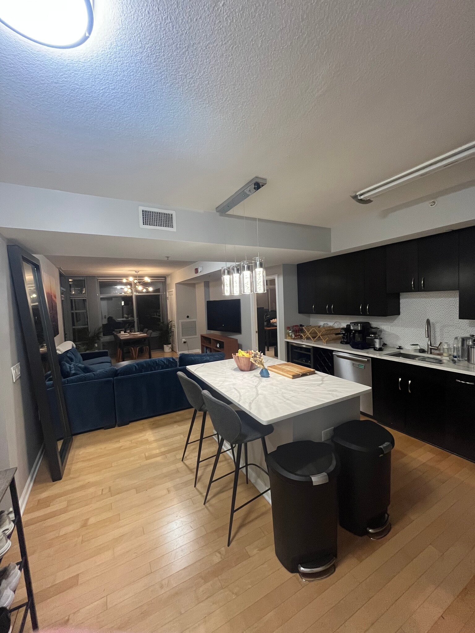 Kitchen and living room, view from entryway (when it was furnished with my stuff). - 440 L St NW