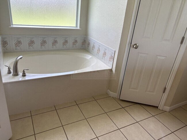 Building Photo - 6109 Lolly Loop