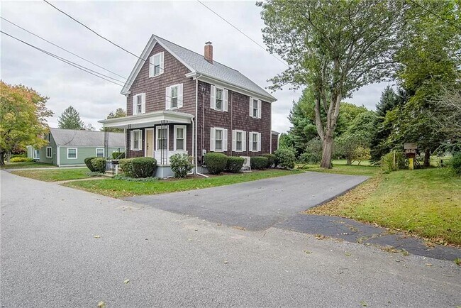 This property has two separate driveways - 27 Commonwealth Ave